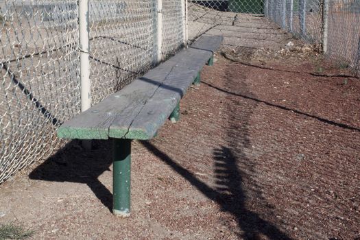 Old weathered baseball benches.