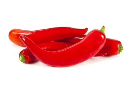 Fresh red hot pepper on a white background