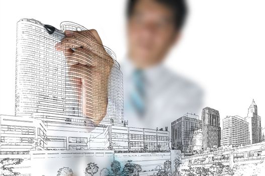 Business Man or architect draw building and cityscape