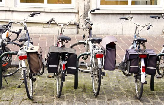 Bicycle parking place. Bicycles with carrying boxes for tourism.