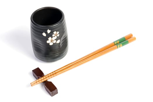 Chopsticks and tea bowl-japanese kitchen utensil on white background