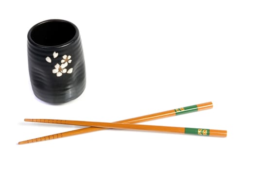 Chopsticks and tea bowl-japanese kitchen utensil on white background