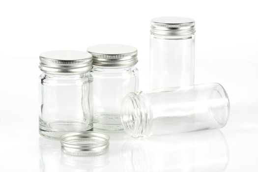 Group of empty pills bottle on white background