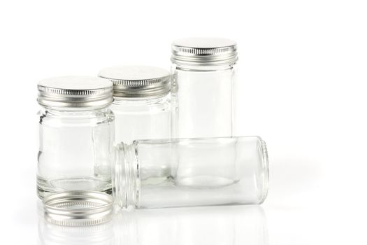 Group of empty pills bottle on white background