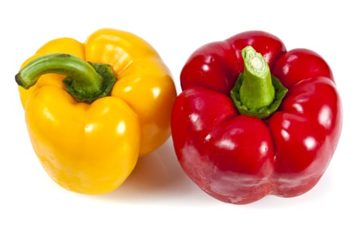 Yellow and red bell pepper on white background