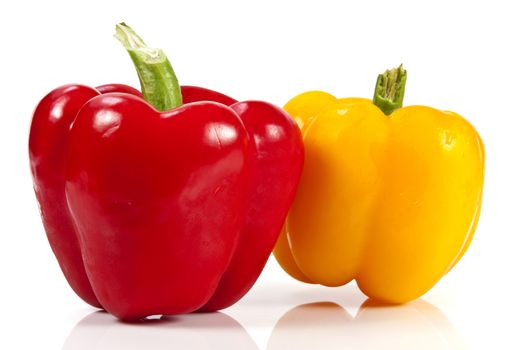 Yellow and red bell pepper on white background