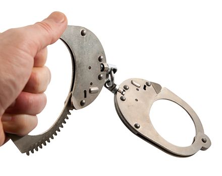 Man hand with handcuffs isolated on white background