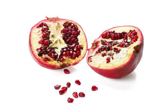 halves of a pomegranate, and the grain in front of him