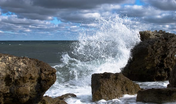 big wave breaking over the big stone