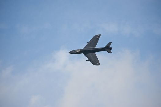 LEEUWARDEN, FRIESLAND, THE NETHERLANDS-SEPTEMBER 17: Black Hawker Hunter at the Air show on September 17, 2011 at RNLAF Leeuwarden Airbase