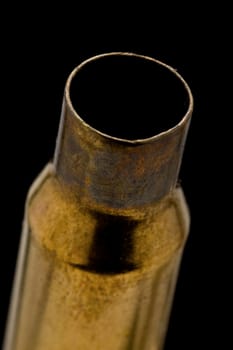 Dirty Used .303 British shell casing on black