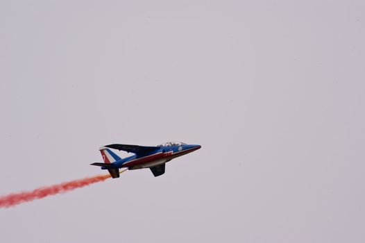 CERNY LA FERTÉ ALAIS, FRANCE - JUNE 12: Patrouille de France performing at Aerial Meeting "The propeller era" in Cerny La Ferté Alais, France on June 12, 2011