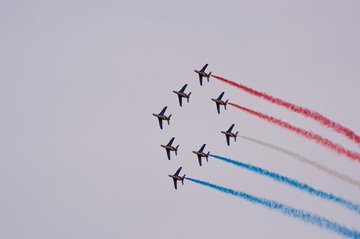 CERNY LA FERTÉ ALAIS, FRANCE - JUNE 12: Patrouille de France performing at Aerial Meeting "The propeller era" in Cerny La Ferté Alais, France on June 12, 2011