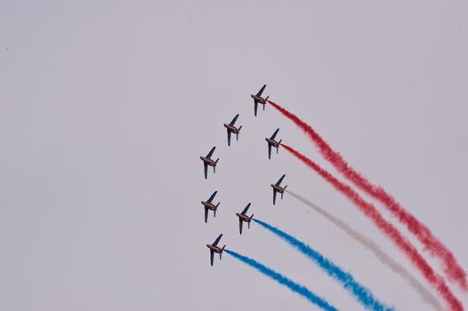 CERNY LA FERTÉ ALAIS, FRANCE - JUNE 12: Patrouille de France performing at Aerial Meeting "The propeller era" in Cerny La Ferté Alais, France on June 12, 2011