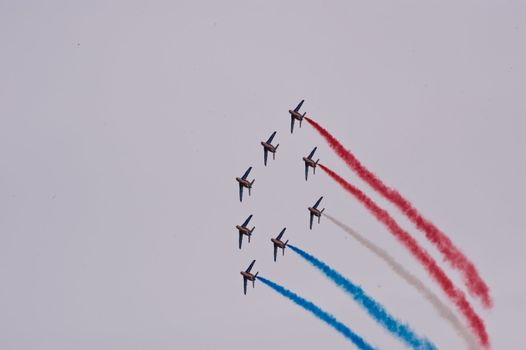 CERNY LA FERTÉ ALAIS, FRANCE - JUNE 12: Patrouille de France performing at Aerial Meeting "The propeller era" in Cerny La Ferté Alais, France on June 12, 2011