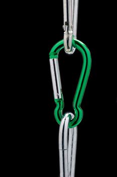 Green carbiner hook forming chain with chrome carbiners