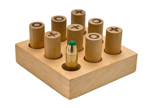 Wooden Tic Tac Toe game with one bullet hinting at the senseles war games