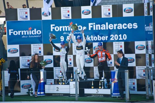 ZANDVOORT, THE NETHERLANDS - OCTOBER 10:  Penultimate Dutch GT4 race podium with Sebastiaan Bleekemolen, Phil Bastiaans and Ricardo van der Ende at Formido Finale Races at Circuit Park Zandvoort in Zandvoort, The Netherlands on October 10, 2010