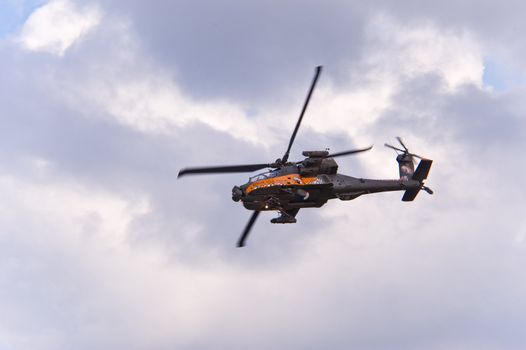 EDE, THE NETHERLANDS - SEPTEMBER 18: AH-64 Apache at Jan Hilgers Memorial / Airborne drop Arnhem 1944 Memorial in Ede, The Netherlands on September 18, 2010