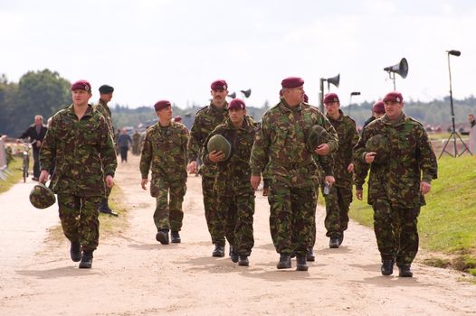 EDE, THE NETHERLANDS - SEPTEMBER 18: Paratroopers after their drop at Jan Hilgers Memorial / Airborne drop Arnhem 1944 Memorial in Ede, The Netherlands on September 18, 2010