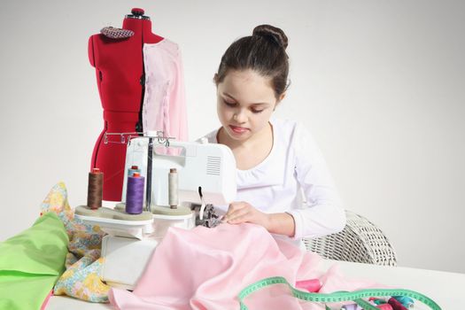 Portrait of little seamstress