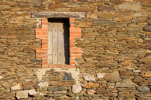 Background texture of an old wall with shuttered window