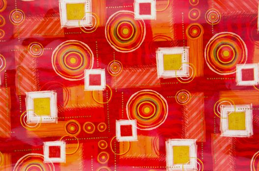 Interesting colorful table cloths background with circles and squares.