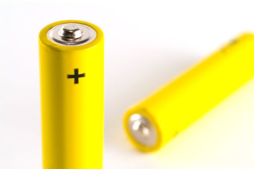 Two yellow AAA alkaline batteries