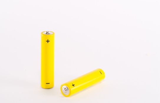 Two yellow AAA alkaline batteries