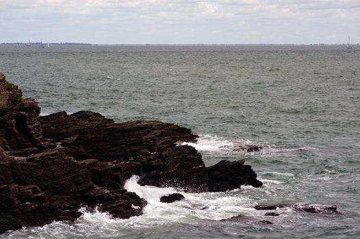 Waves braking on the rocky french atlantic coast