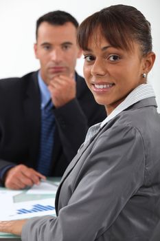 businessman and businesswoman having a discussion