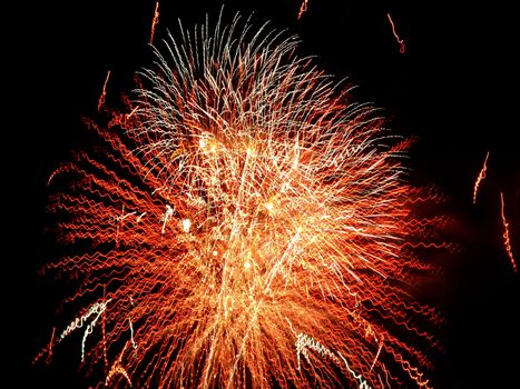 Long Exposure of Multicolored Fireworks Against a Black Sky