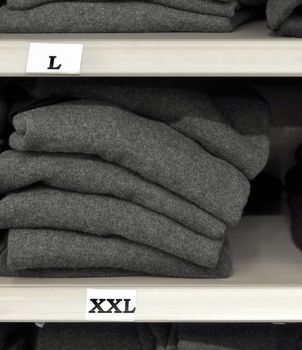 Cloths on a shelf in a department store