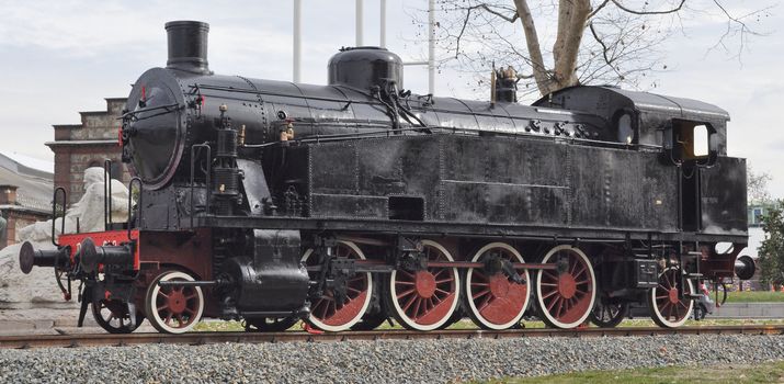 Detail of ancient steam train locomotive vehicle