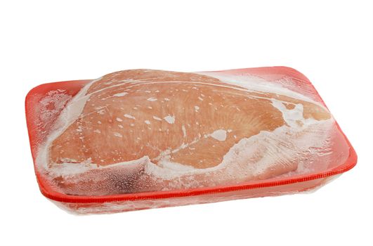 Frozen raw turkey breast on foam meat tray isolated on white background