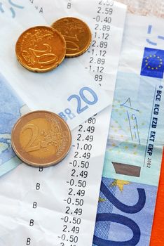 closeup of bills and euro banknotes and coins macro