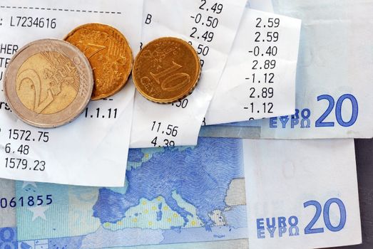 closeup of bills and euro banknotes and coins macro