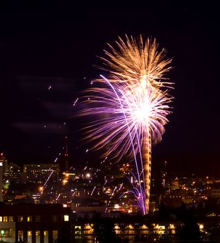 Fireworks Against the Night Sky of a Cityscape