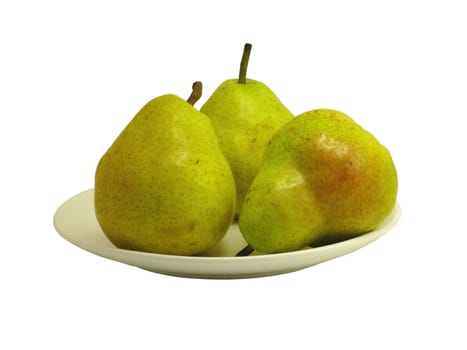 Three pears on white dish isolated on white