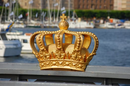 The golden crown on the bridge to Skeppsholmen in Stockholm, Sweden.