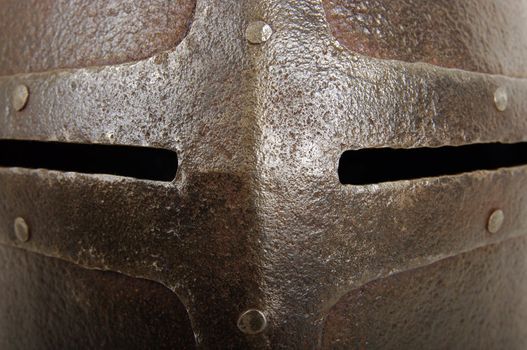 Iron helmet of the medieval knight. Very heavy headdress.