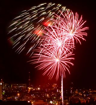 Fireworks Against the Night Sky of a Cityscape