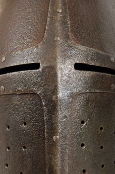 Iron helmet of the medieval knight. Very heavy headdress