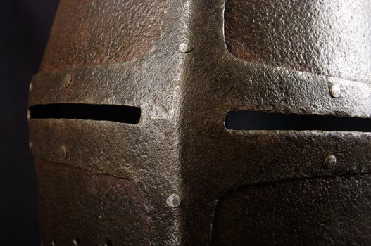 Iron helmet of the medieval knight. Very heavy headdress