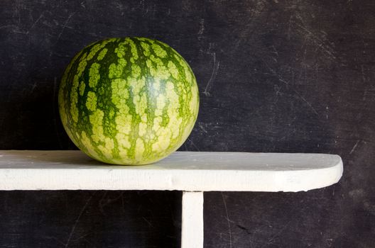 watermelon on white board and black background