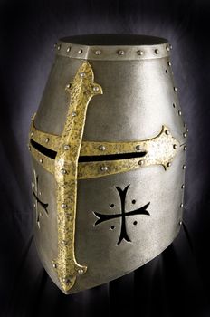 Iron helmet of the medieval knight. Very heavy headdress