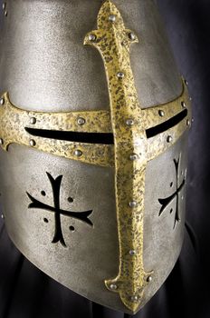 Iron helmet of the medieval knight. Very heavy headdress