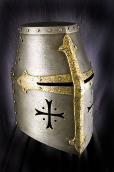 Iron helmet of the medieval knight. Very heavy headdress