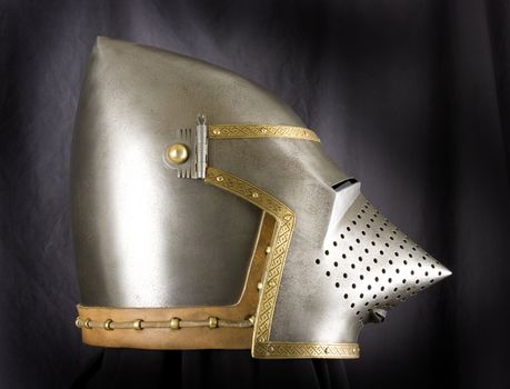 Iron helmet of the medieval knight. Very heavy headdress