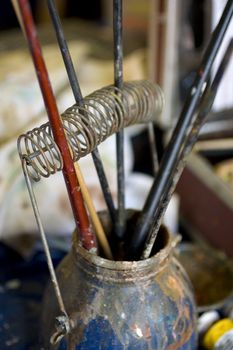 Photo of paintbrushes inside a cup